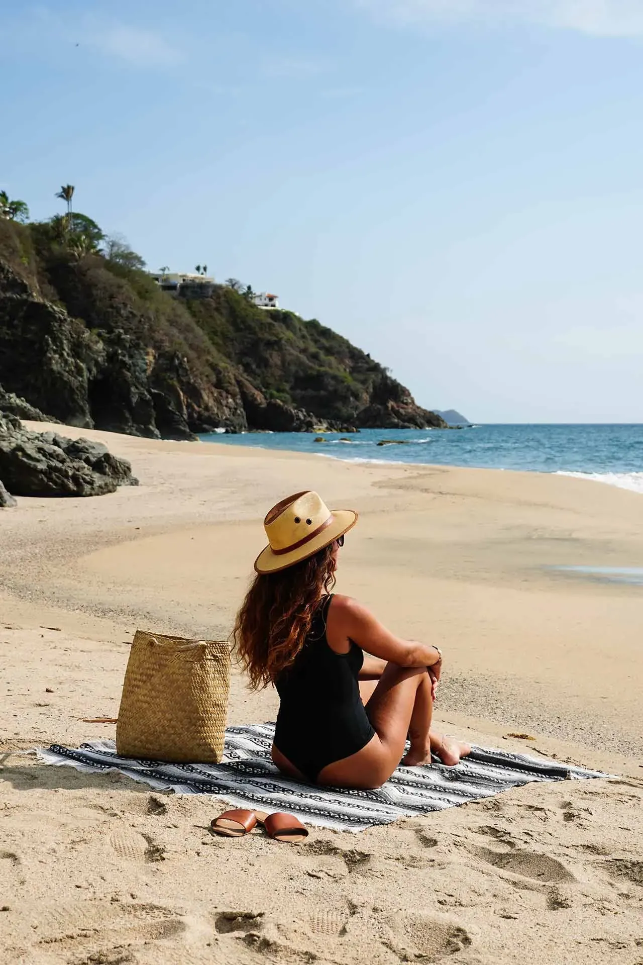 woman-enjoying-the-view-of-the-beach-of-san-pancho